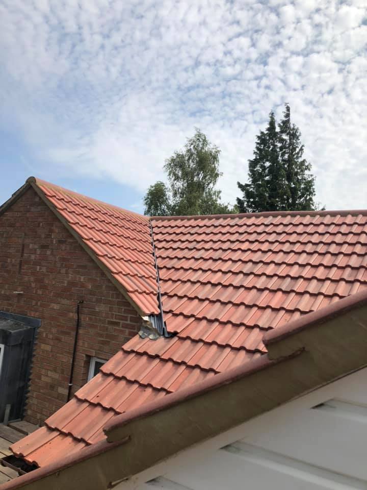 New tiled roofs by Darlington Roofers Masterhouse Services Limited