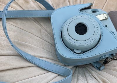 A light blue polaroid camera - Optional add-on to make each Posh Unicorn Luxury Picnic in San Diego unique