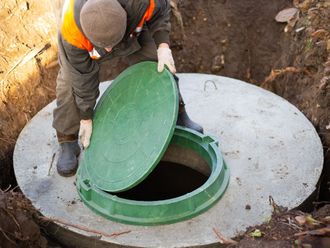 Opening the Septic Tank — North Branch, MN — Hassle Free Septic