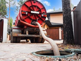 Septic Tank Truck is Pumping Water into a Manhole — North Branch, MN — Hassle Free Septic