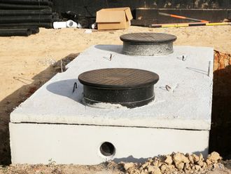 Concrete Septic Tank is Being Built in a Dirt Field — North Branch, MN — Hassle Free Septic