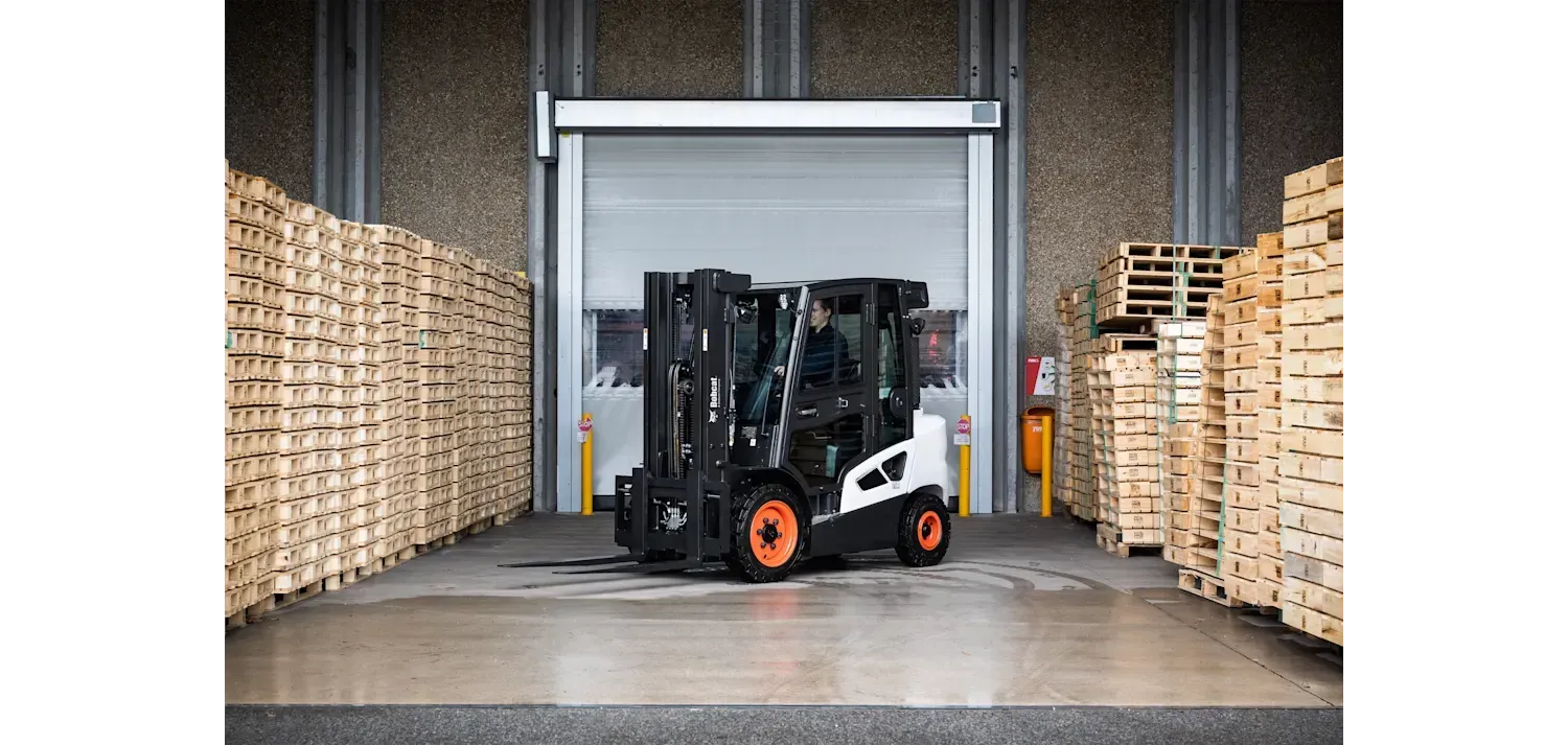 A black and white forklift on a white background.