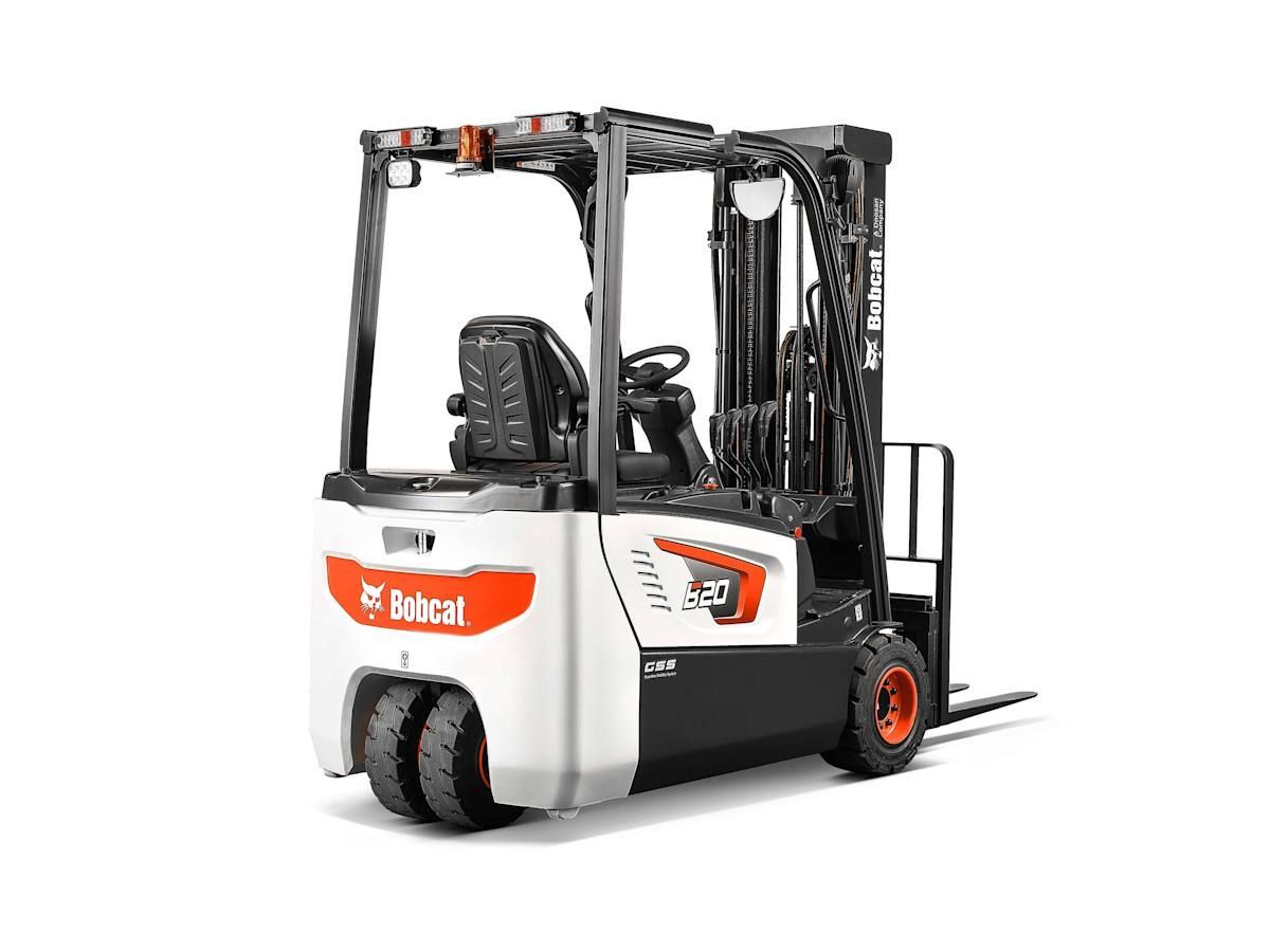 A forklift is sitting on a white surface.