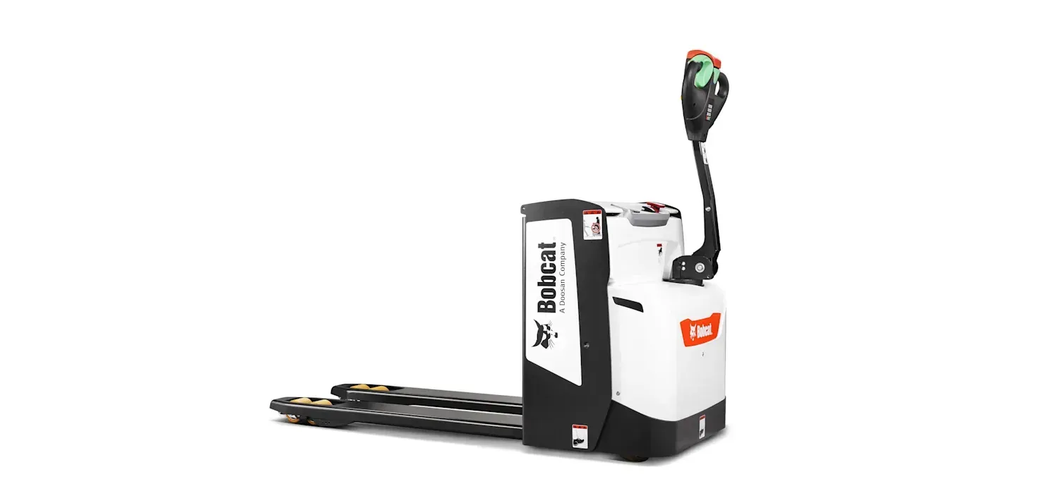 A white and black pallet truck is sitting on a white surface.