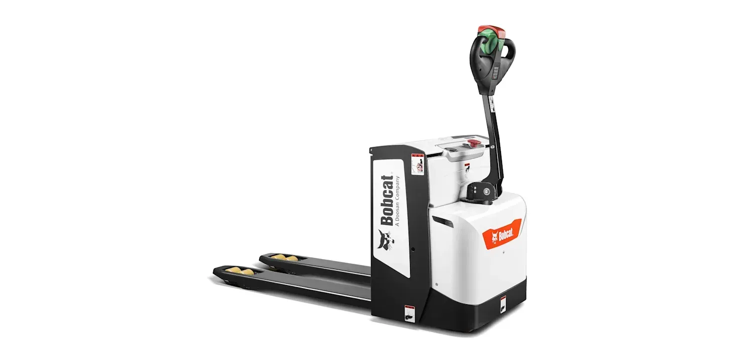 A white and black pallet truck is sitting on a white surface.