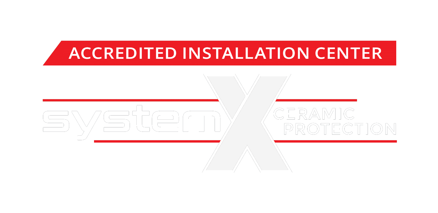 Red “Accredited Installation Center” banner with a faint System X logo and gray text on white background