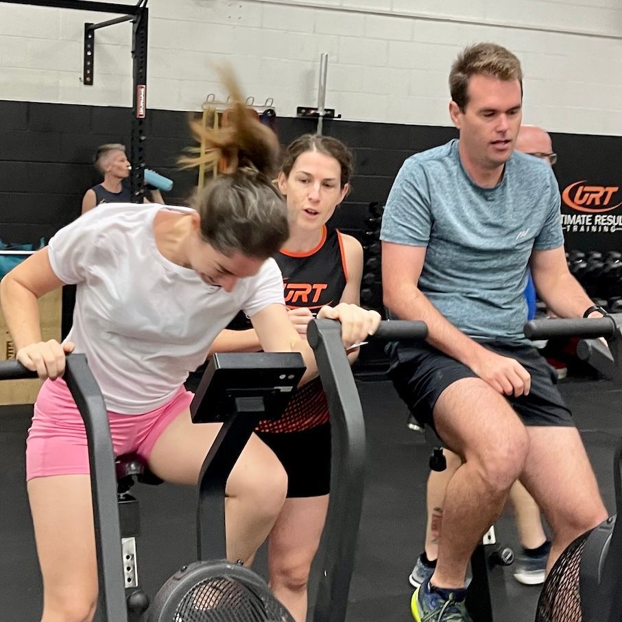 Group Using Exercise Bikes — Ultimate Results Training in Aitkenvale, QLD