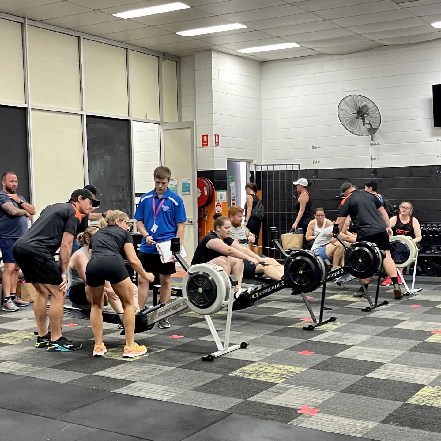 People Are Doing Exercises On A Machine In A Gym — Ultimate Results Training in Aitkenvale, QLD