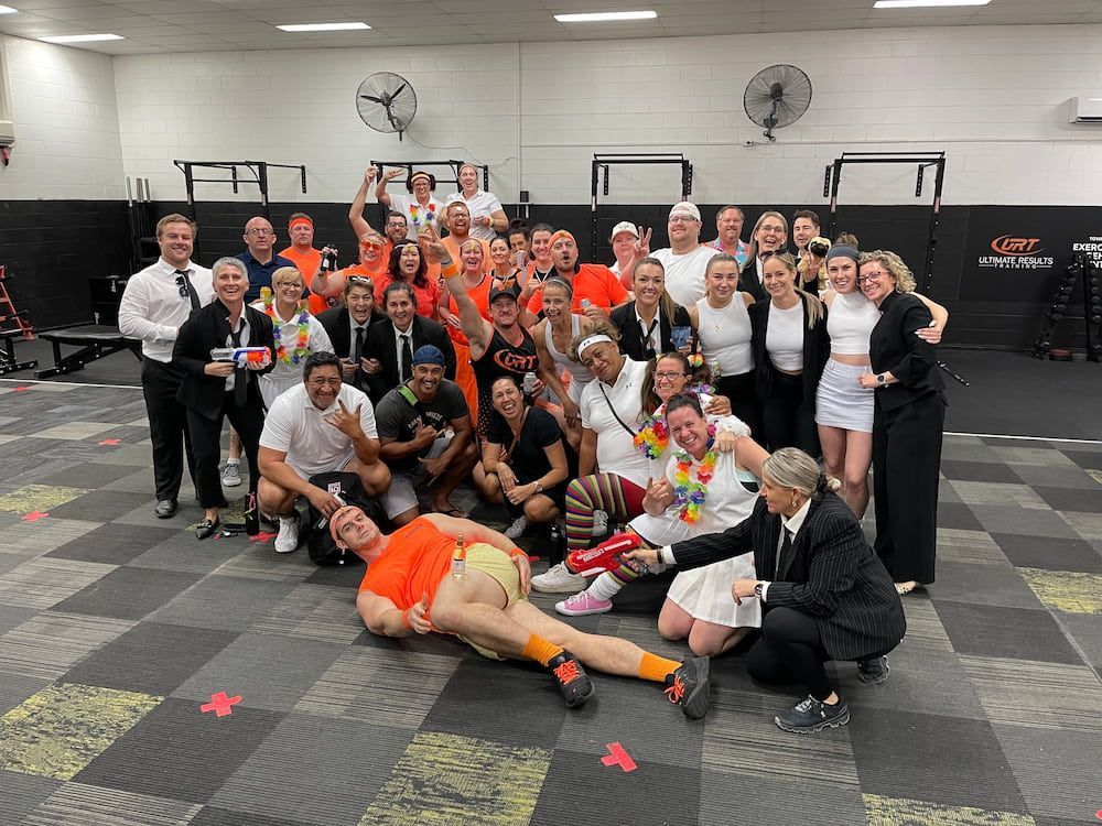 A Group Of People Are Posing For A Picture In A Gym — Ultimate Results Training in Aitkenvale, QLD