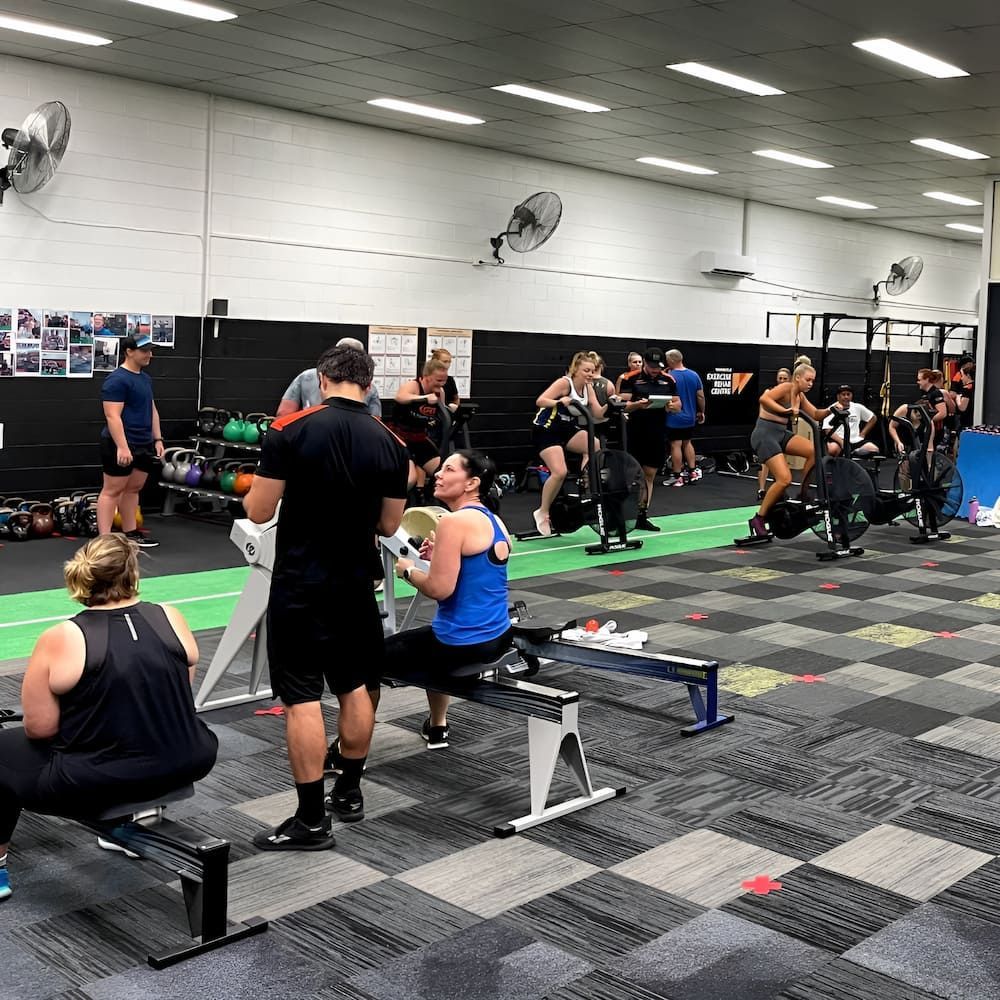 People Are Doing Exercises In A Gym — Ultimate Results Training in Aitkenvale, QLD
