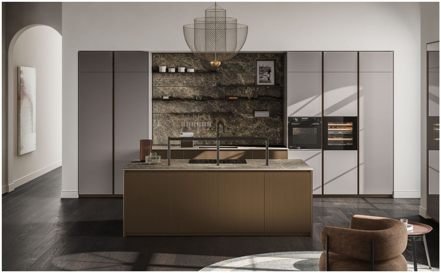 Una cucina con una grande isola al centro della stanza.