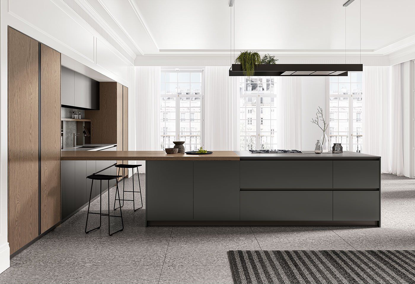 Una cucina moderna con una grande isola al centro della stanza.