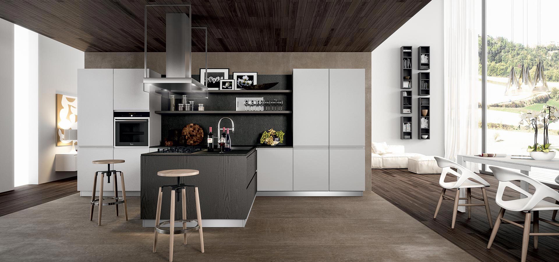 Una cucina con mobili bianchi e un'isola nera