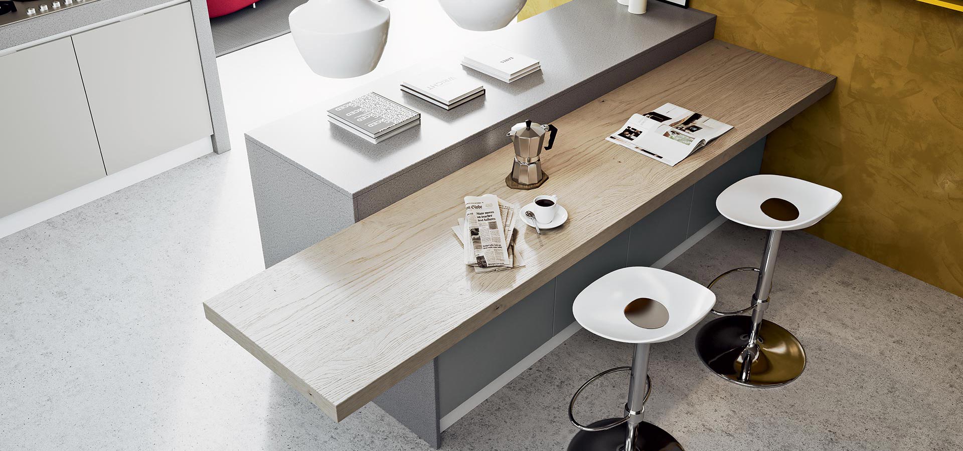 Una cucina con un lungo bancone e due sgabelli