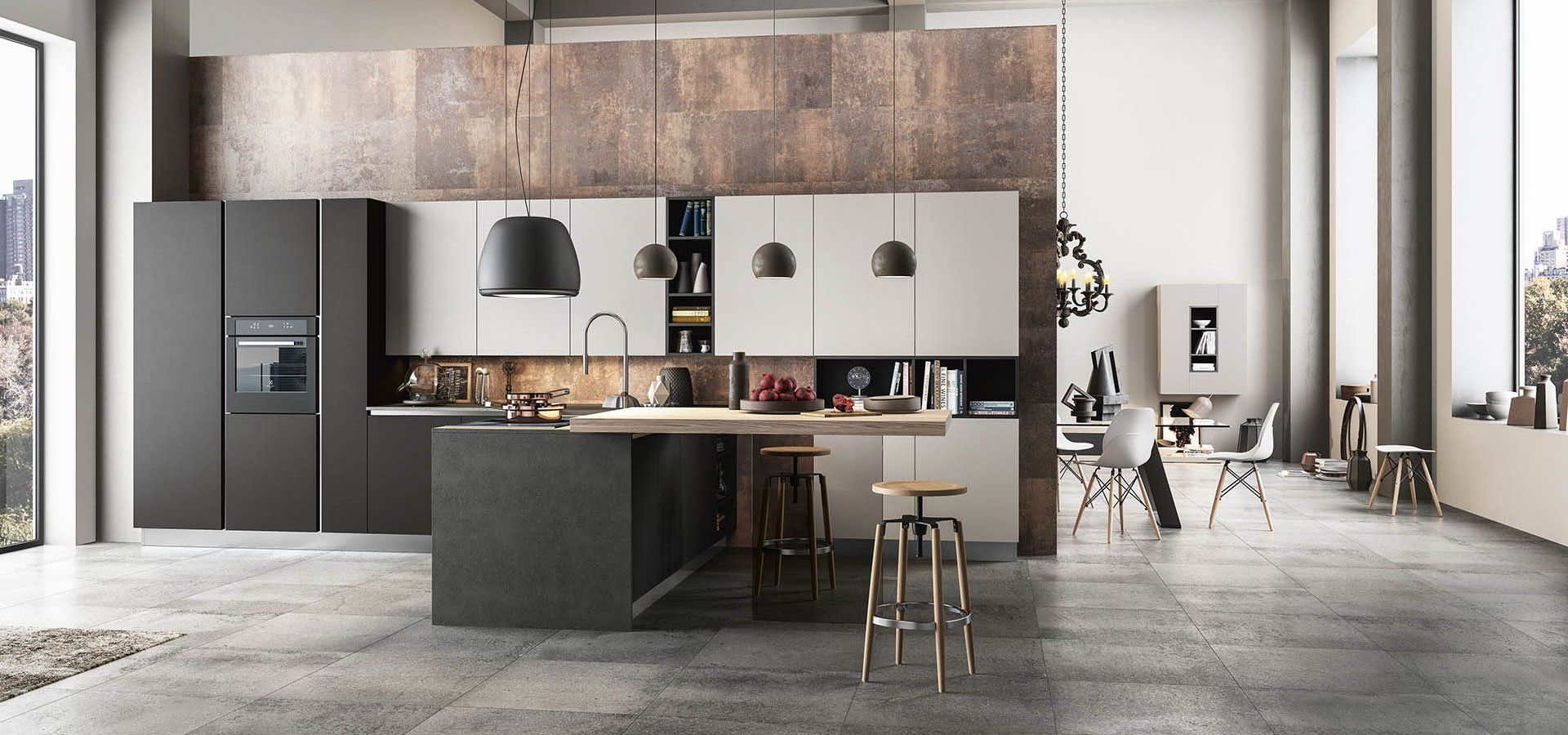 Una cucina moderna con una grande isola al centro della stanza.