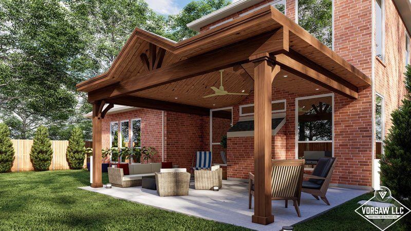 A patio with a wooden pergola and a brick house in the background.