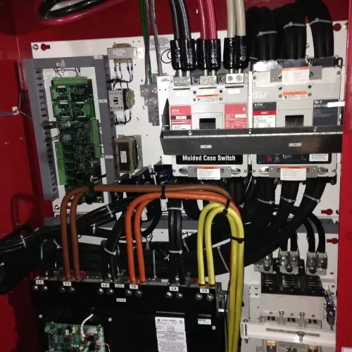 The inside of an electrical box with a mid-sized core switch