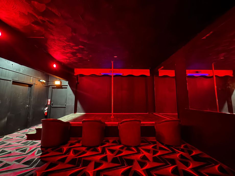 There is a pole in the middle of the room.