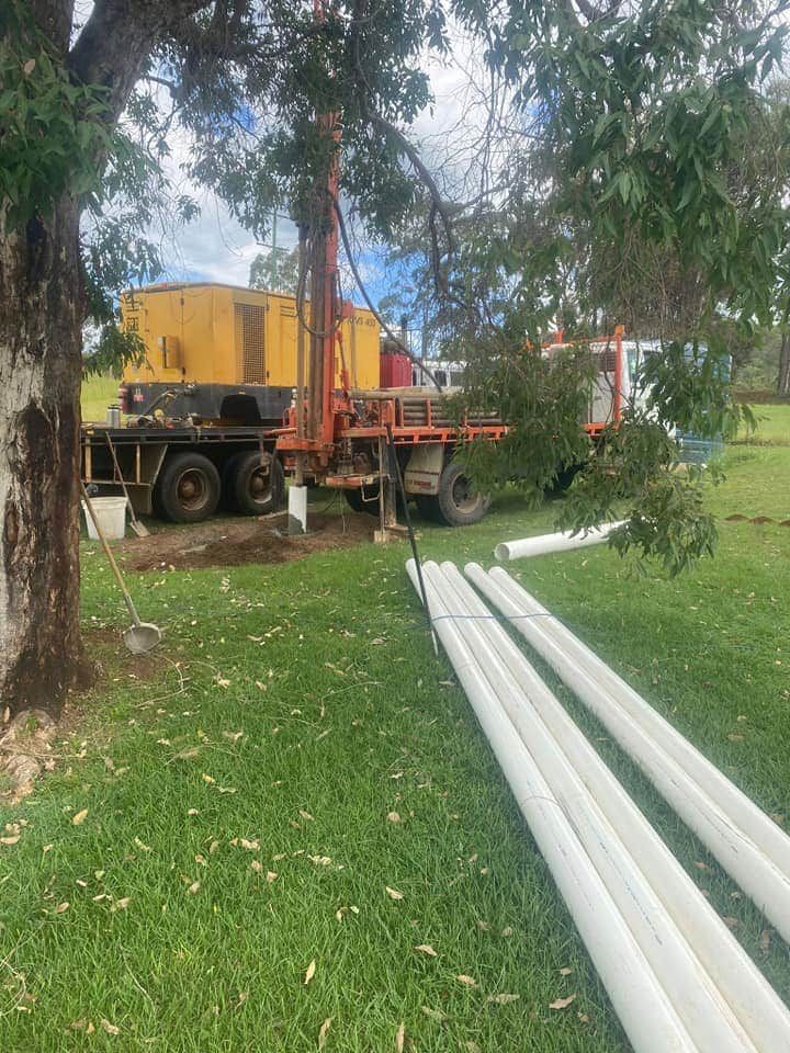 Drilling Truck Is Parked In The Grassy Field — FNQ Drilling in Georgetown, QLD