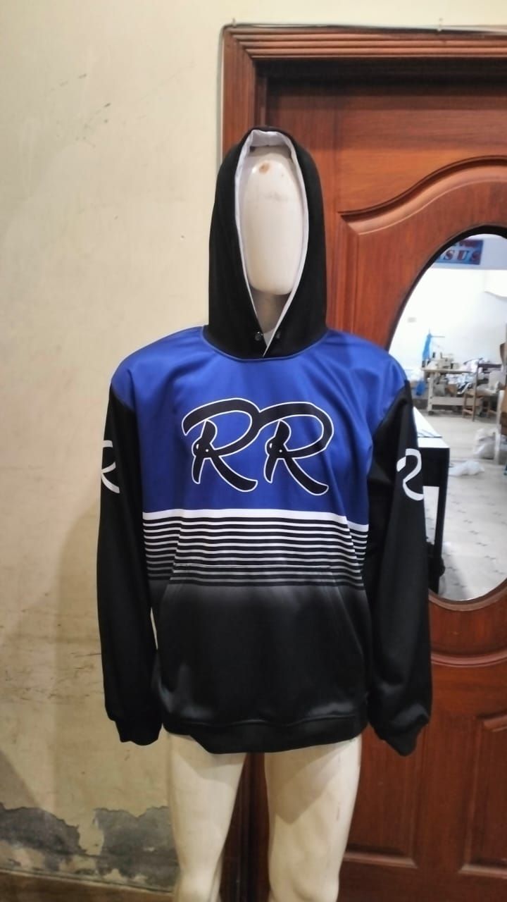 A mannequin wearing a blue and black rr hoodie