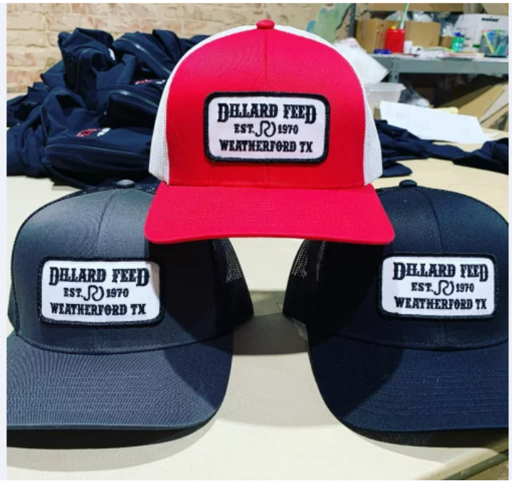 Three hats with the word dillard on them