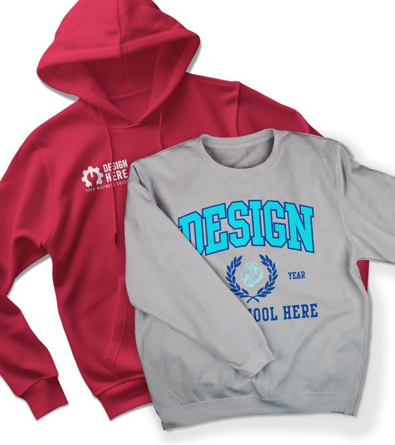 A black t-shirt and a red t-shirt are on a wooden table