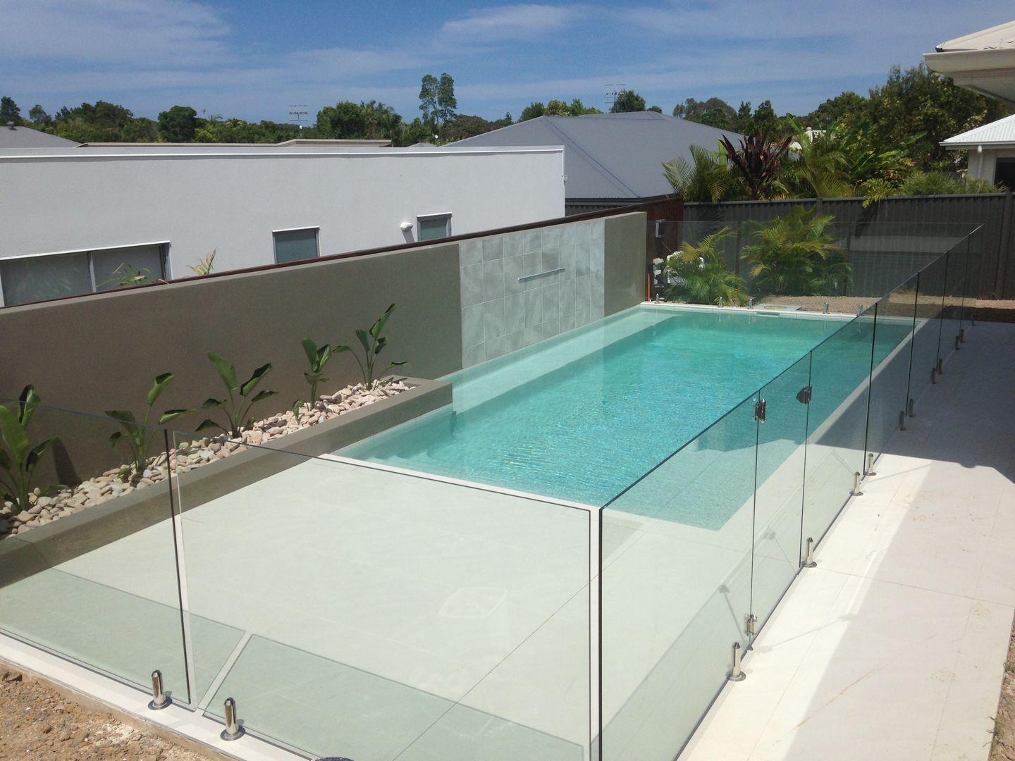 Pool Surrounds with Glass Pool Fencing