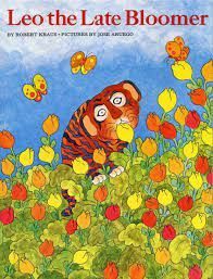 the cover of a children 's book called leo the late bloomer shows a tiger in a field of flowers .