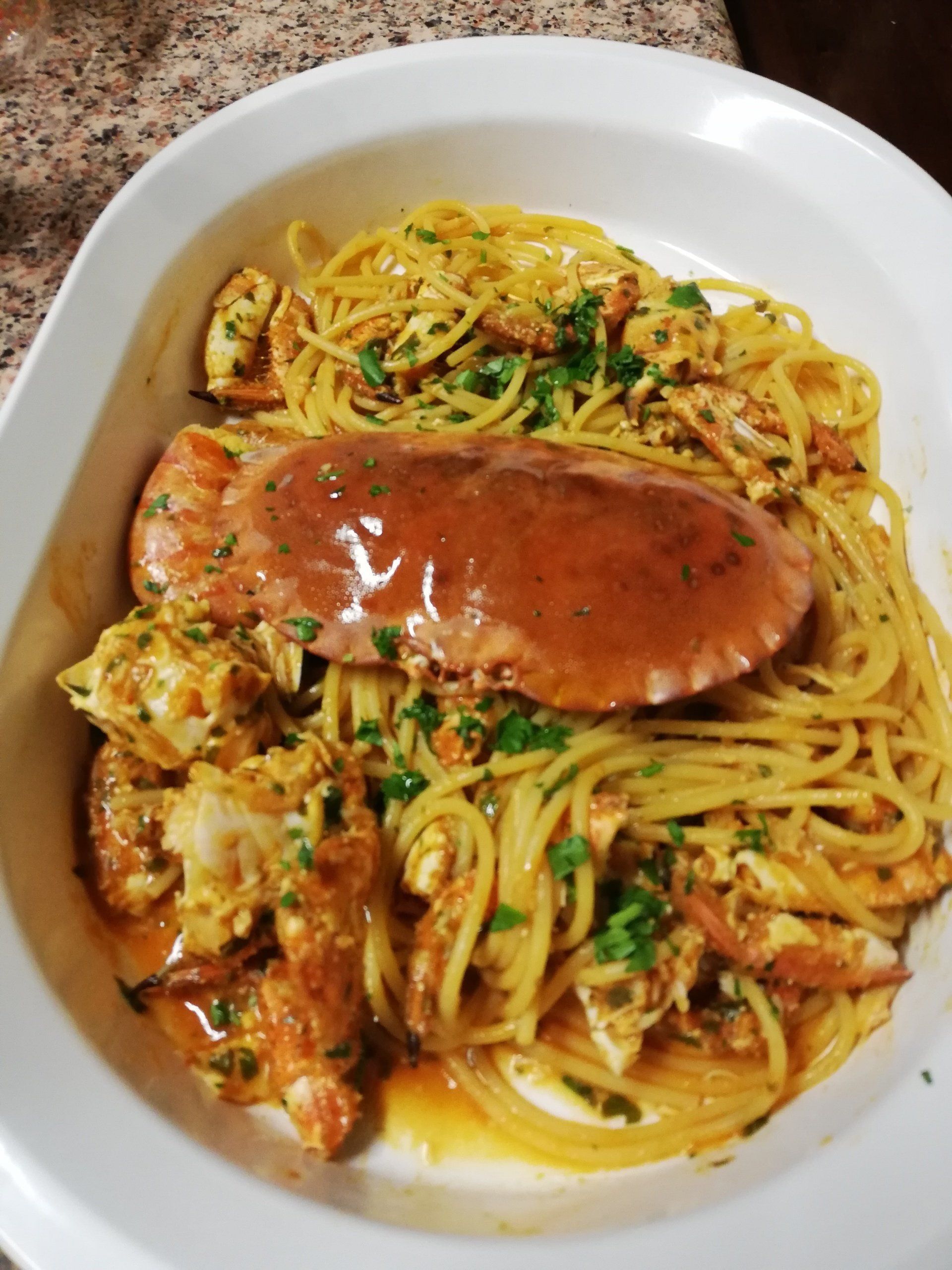 spaghetti con sugo di pesce