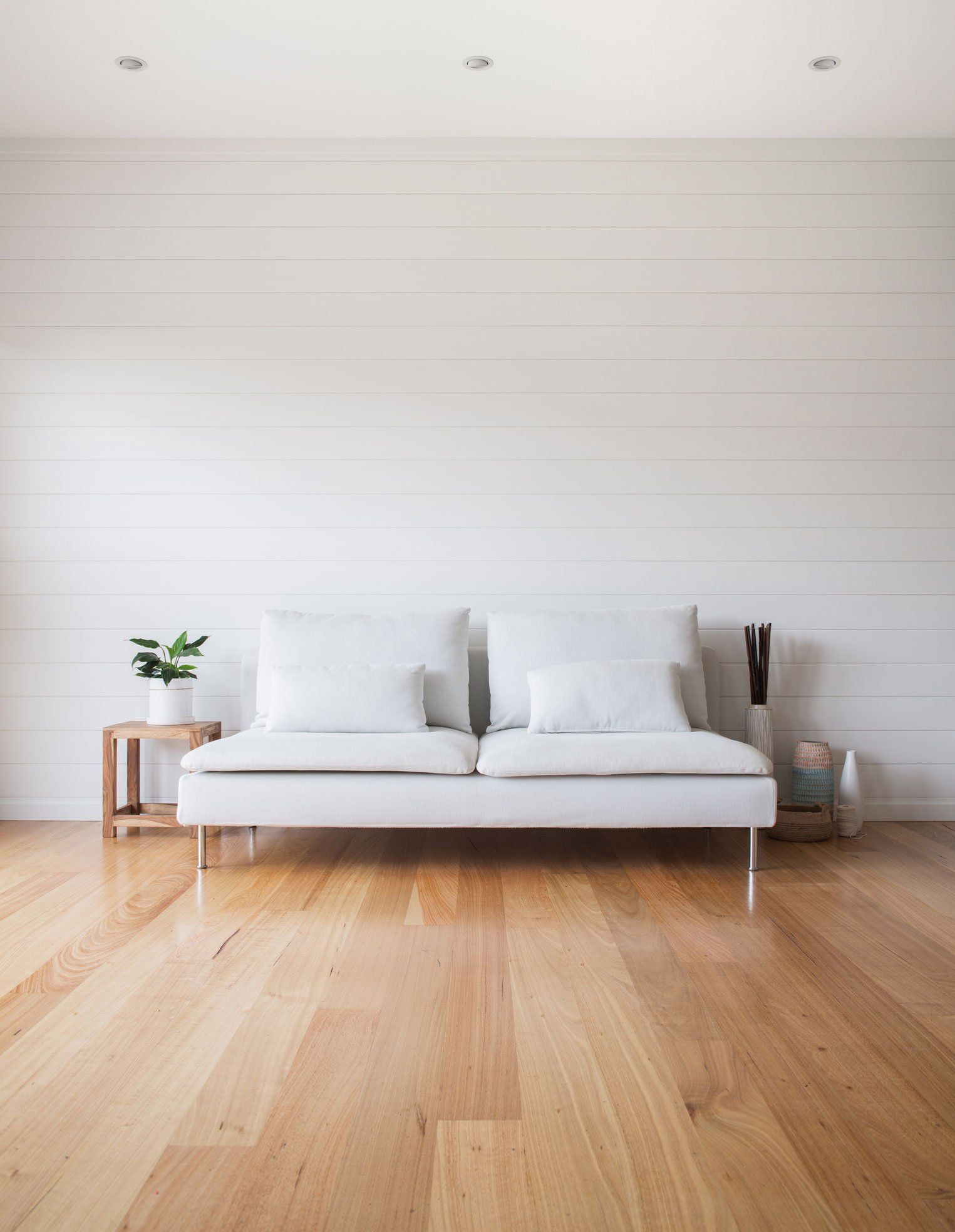 Living Room White Couch Timber Floor — Brisbane, QLD — Integrity Lounge Designs