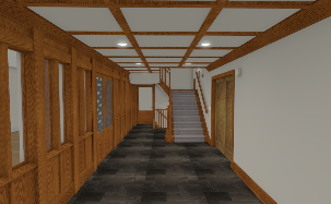 A hallway with wooden walls and stairs in a building.