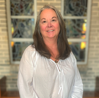 The logo for all saints episcopal church has a cross on it.