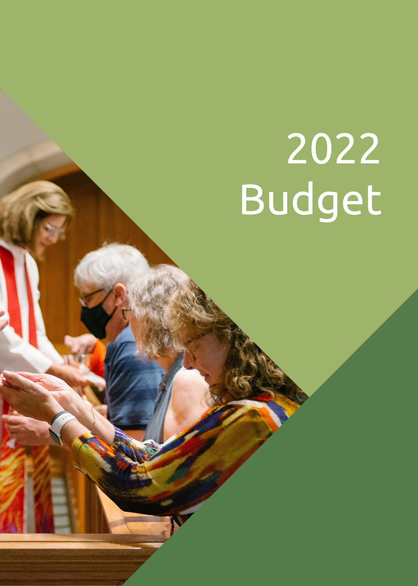 A group of people are praying in a church.