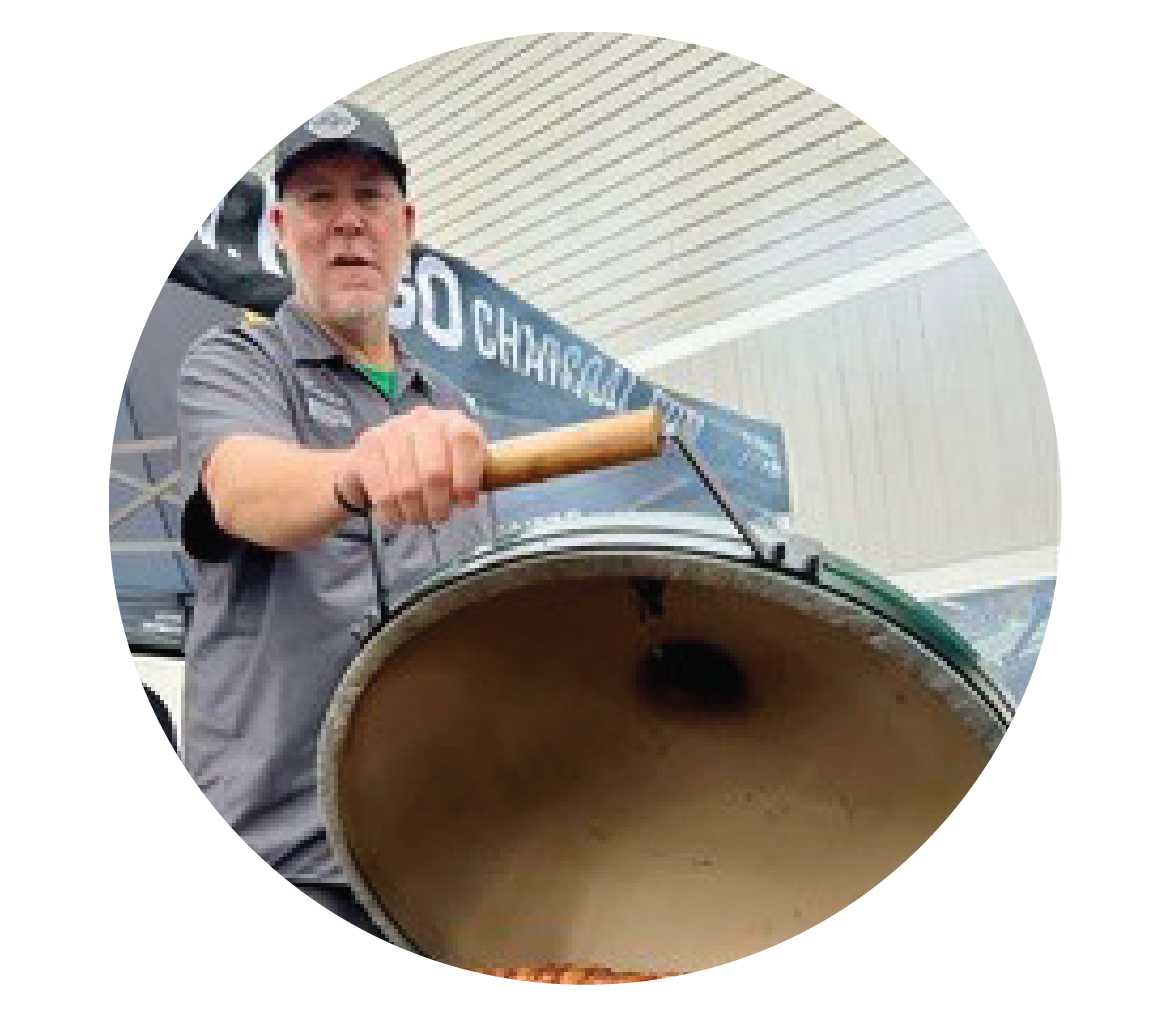 CMAC Cooks Headshot with Big Green Egg Grill