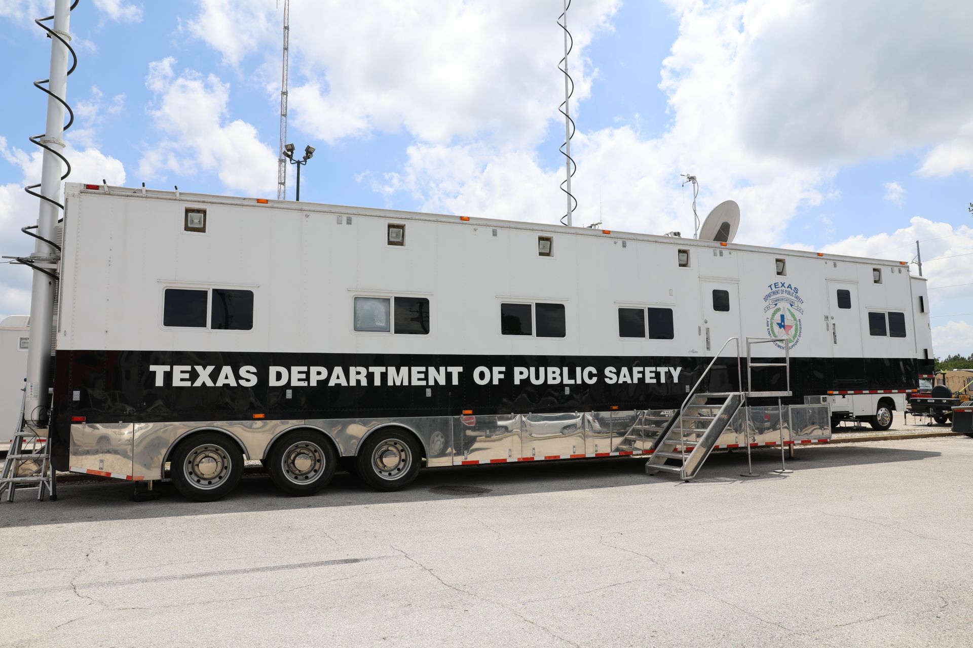 Large black and white trailer used for emergency management