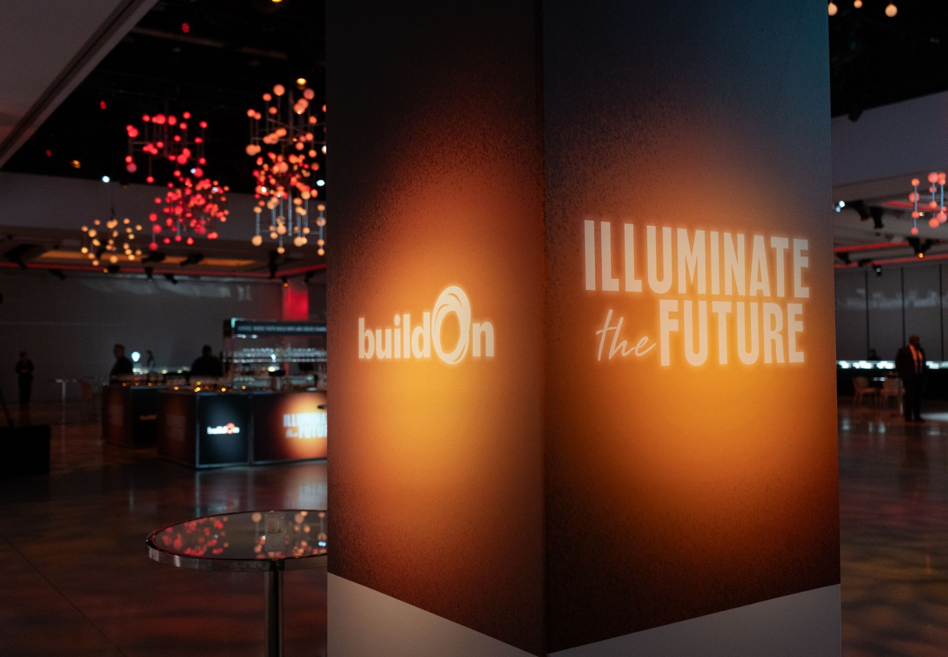A building with a sign that says illuminate the future
