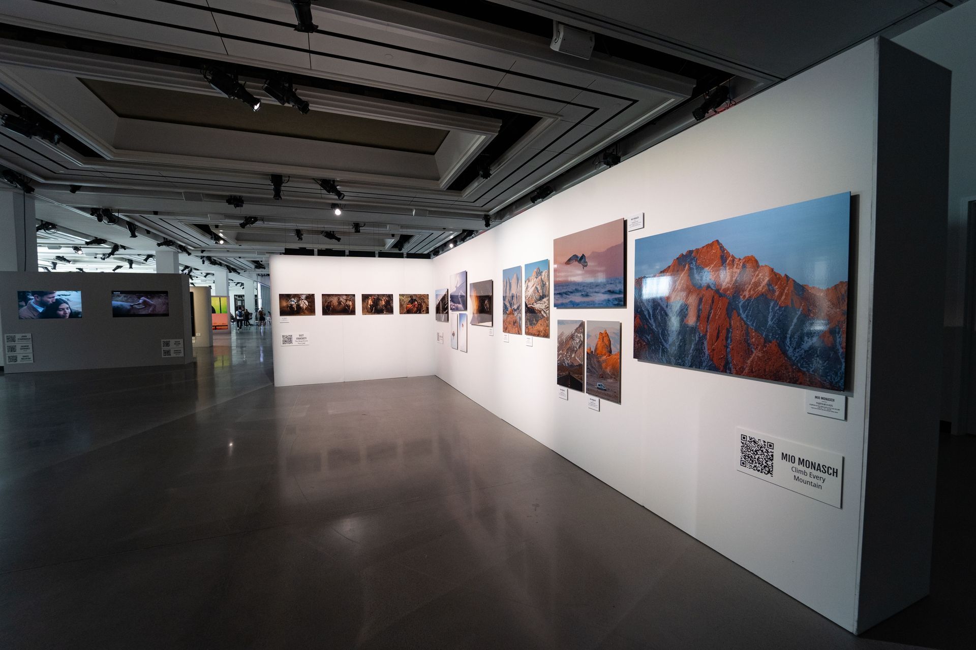 A large room with a lot of pictures on the wall.