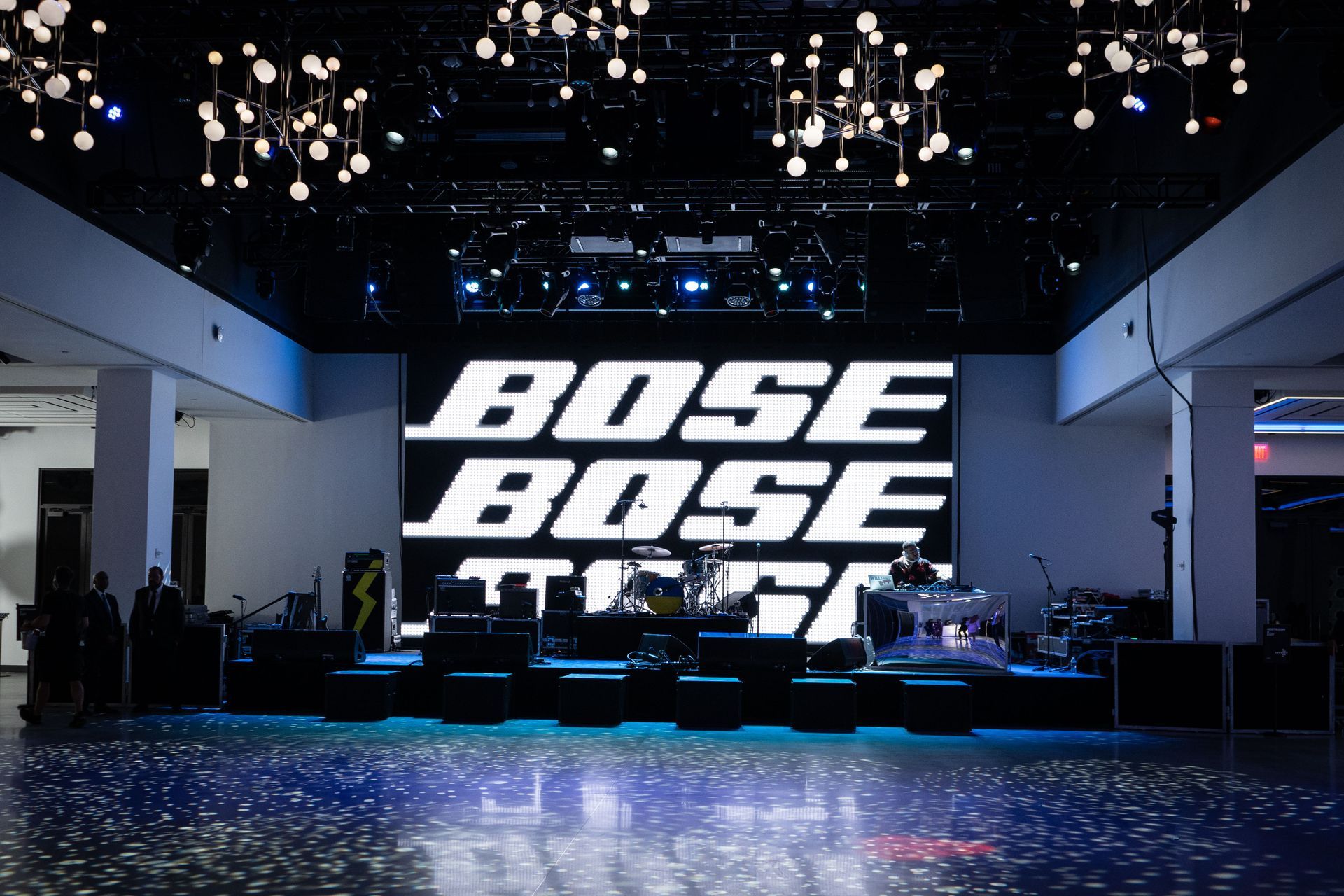 A large stage with a bose logo on it