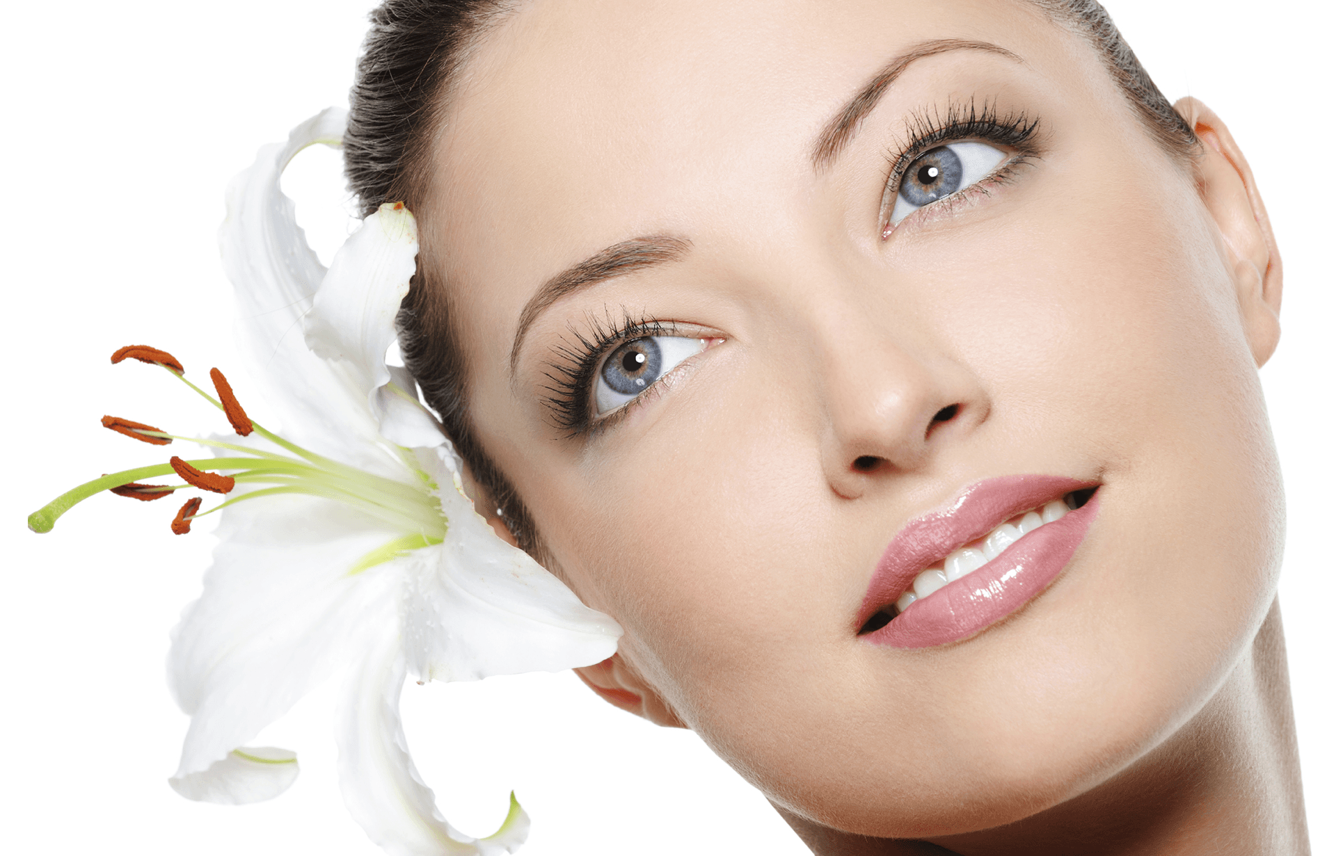a close up of a woman 's face with a flower in her hair .