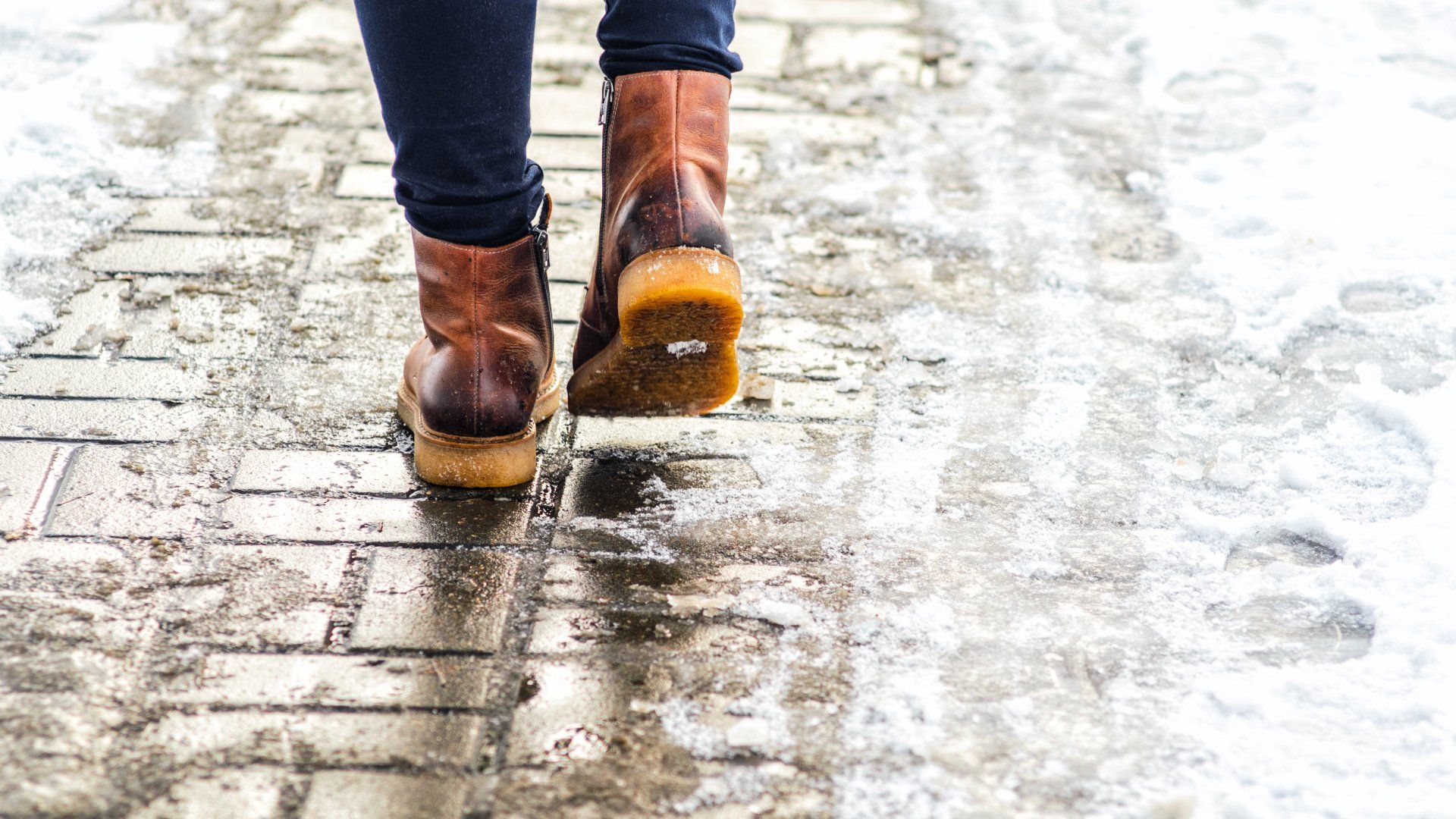 Melted ice on sidewalk