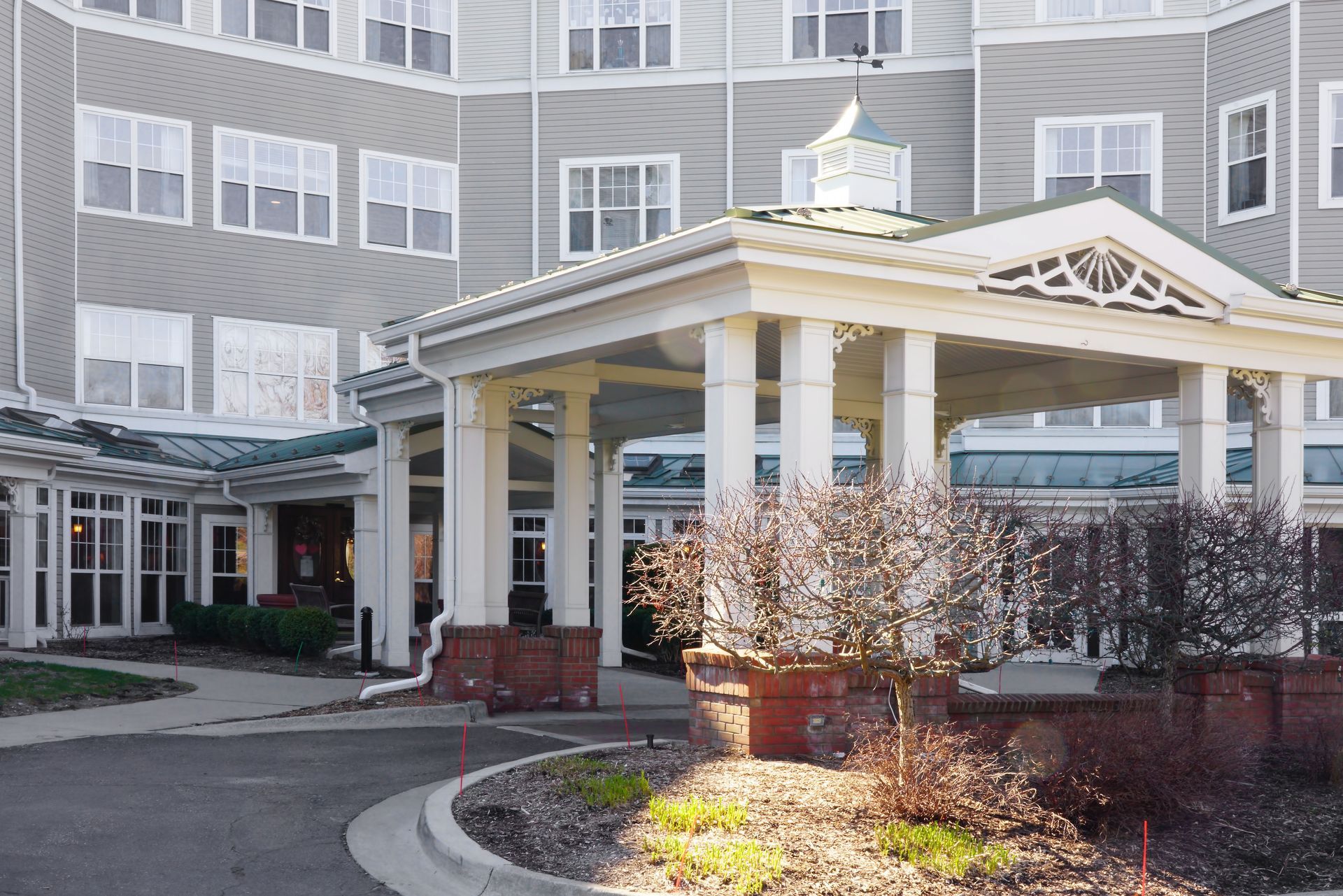 assisted living facility covered in snow and in need of snow removal