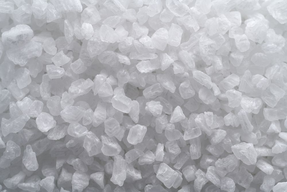 Close-up view of white, crystalline rock salt.