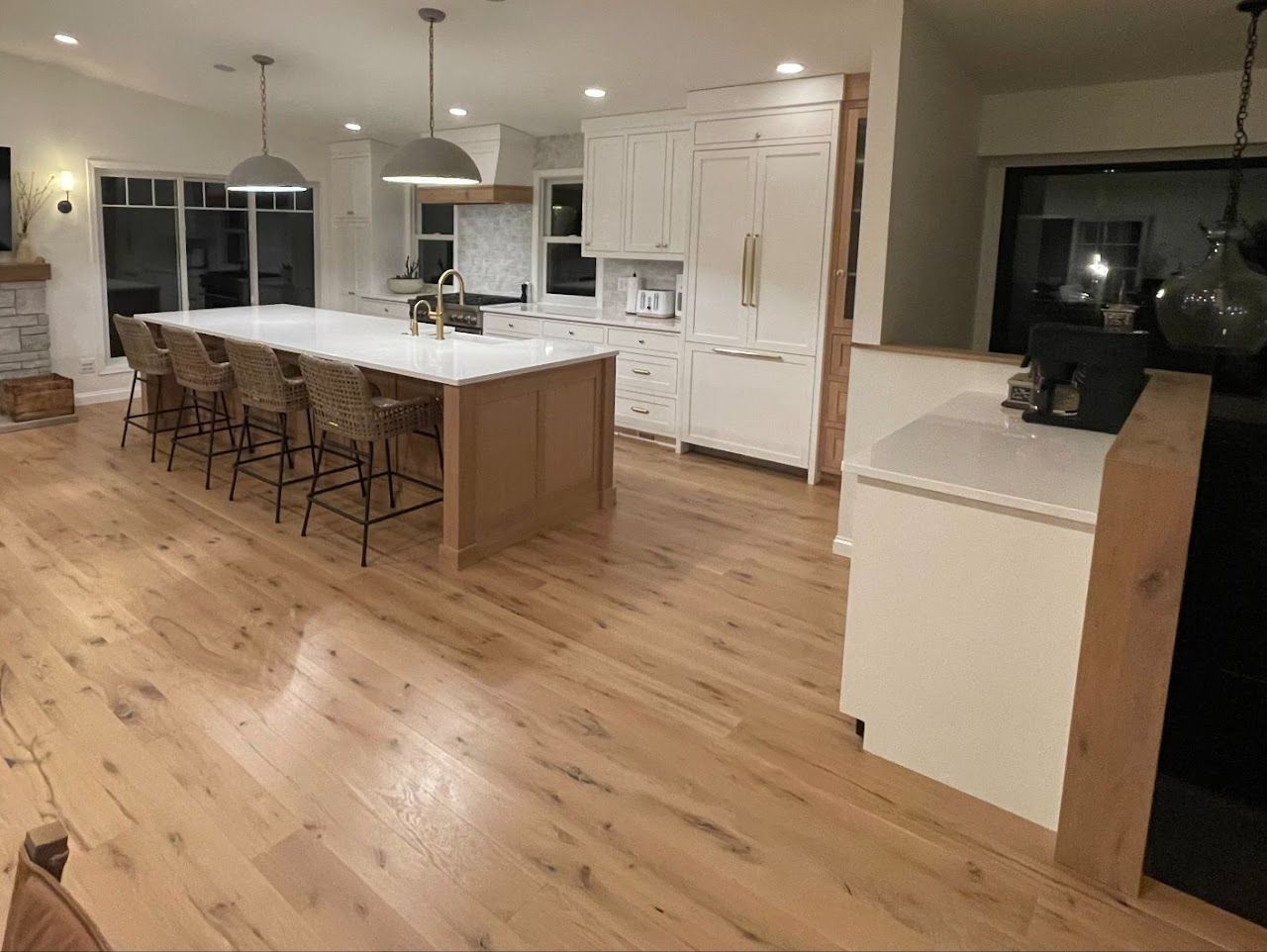 There is a large island in the middle of the kitchen.