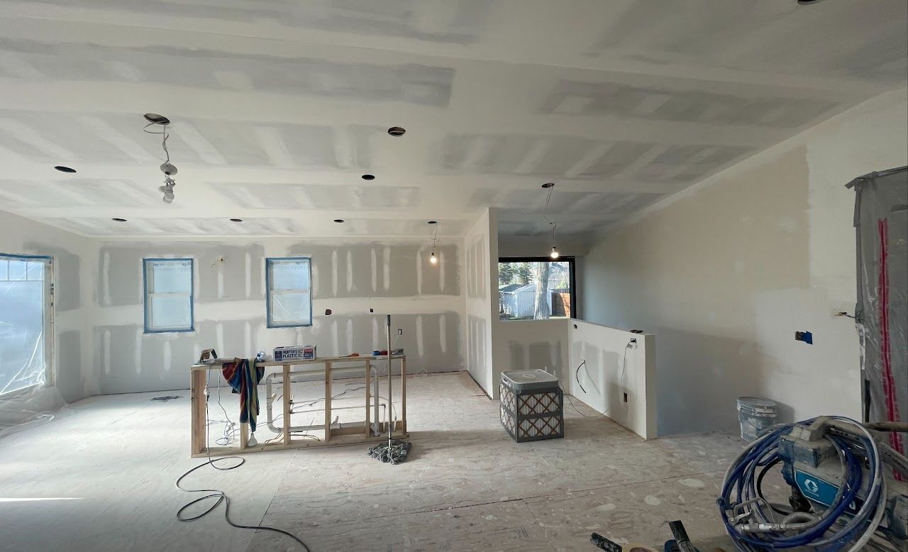 A large room is being remodeled in a house.