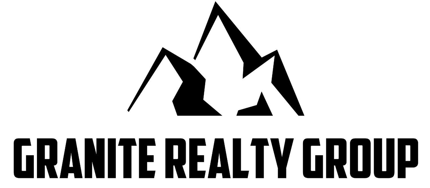 The granite realty group logo is black and white with a mountain in the middle.