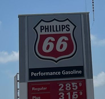 A phillips 66 gas station has regular gasoline for 285 cents