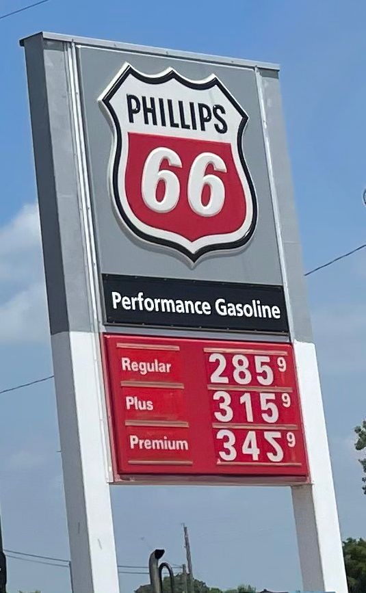 A phillips 66 gas station with a sign that says performance gasoline