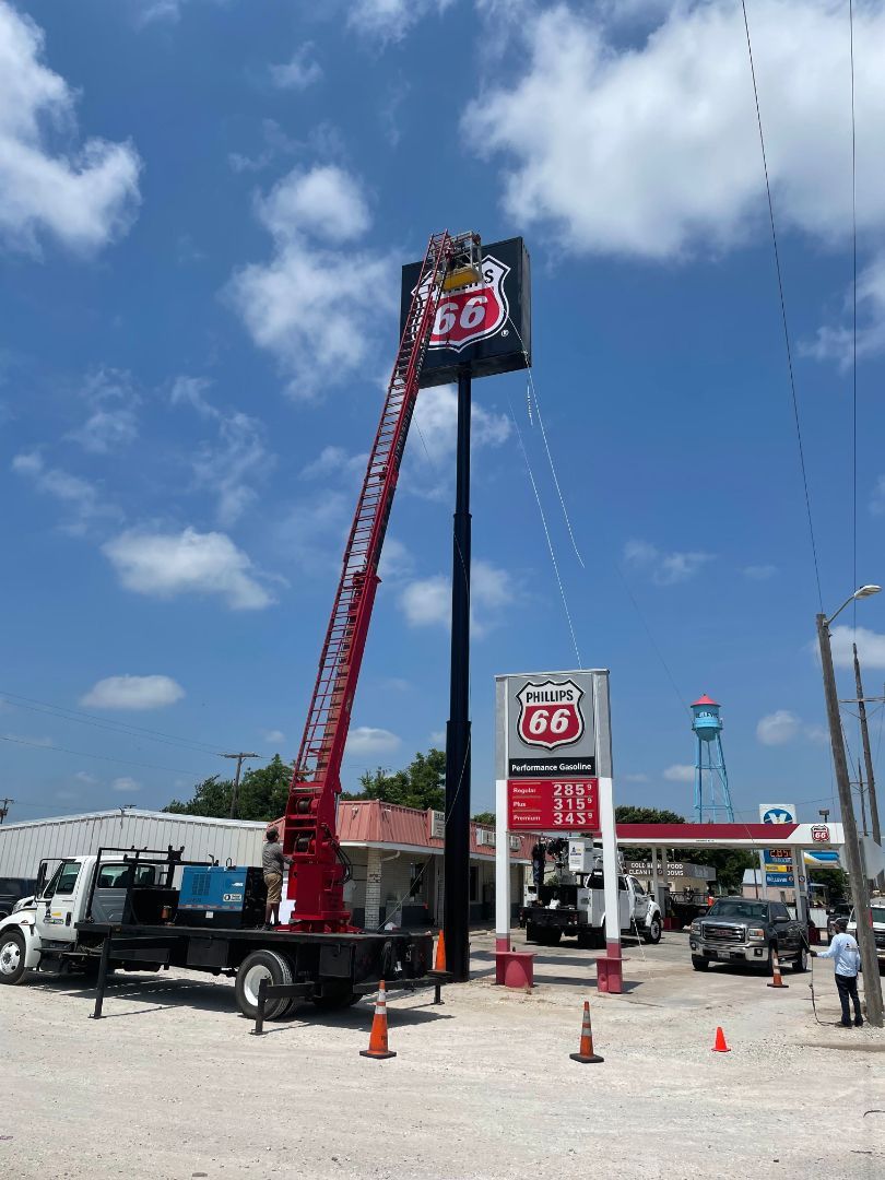 A phillips 66 gas station with a sign that says performance gasoline