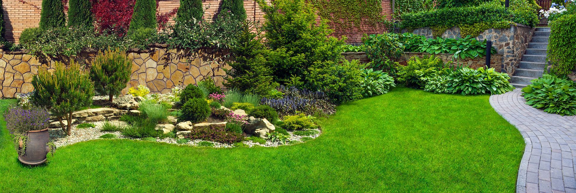 garden stone path grass growing between