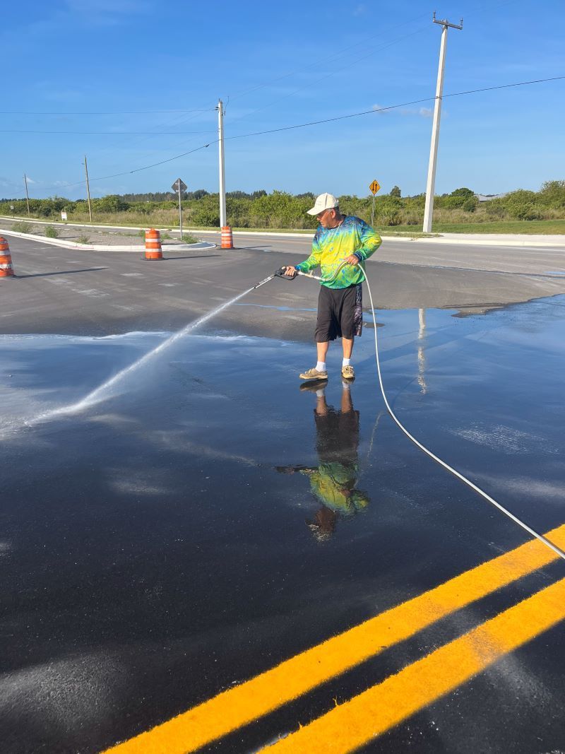 Image of RNR Pressure Cleaning pressure washing a road.